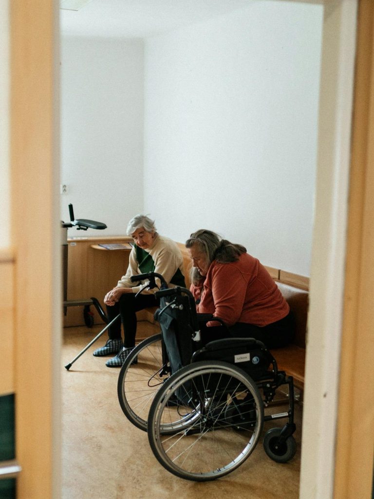 Elderly Women Sitting in the Waiting Room of a Nursing Home